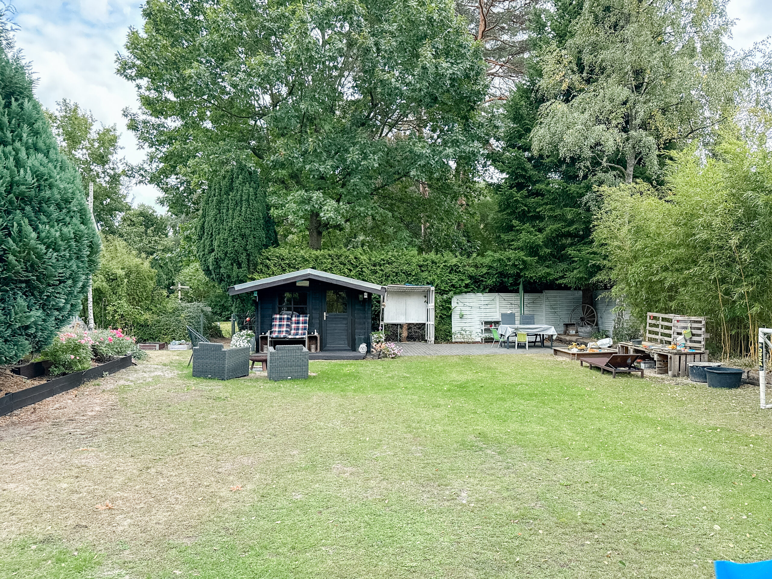 Vielseitiger Bungalow mit großem Grundstück und Vermietungspotenzial in Hambühren - Ansicht