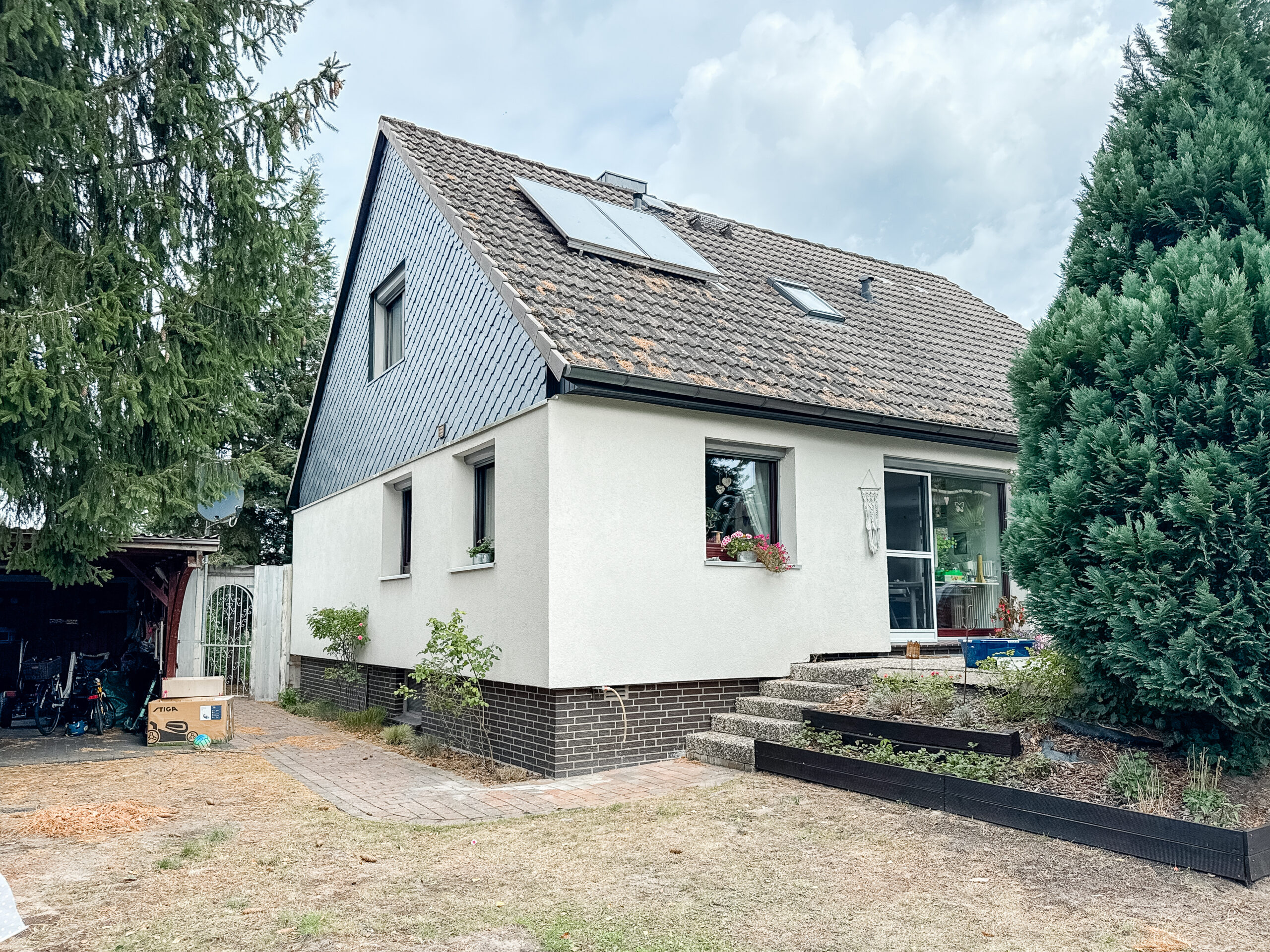 Vielseitiger Bungalow mit großem Grundstück und Vermietungspotenzial in Hambühren - Ansicht