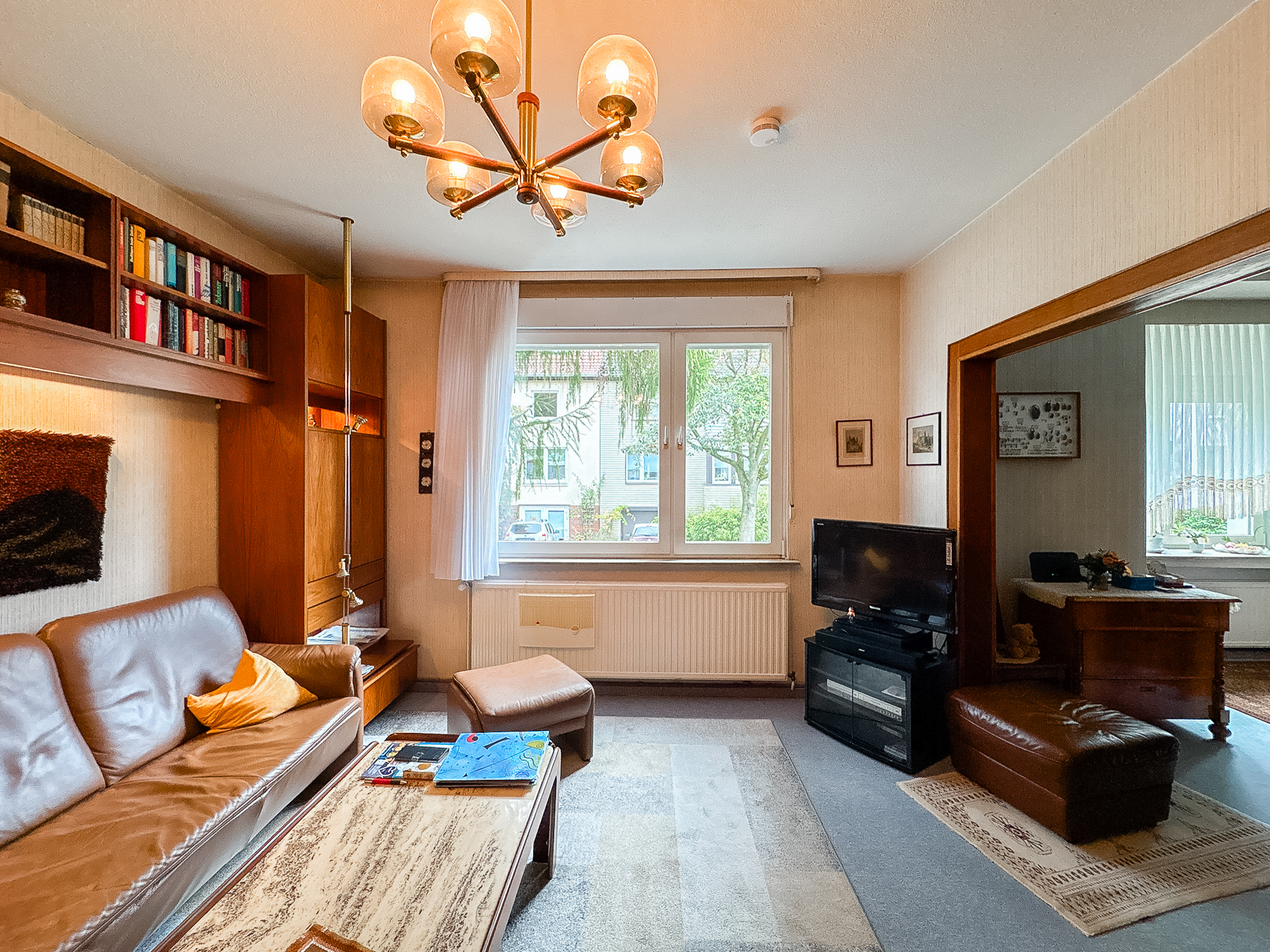 Gepflegte Doppelhaushälfte mit Gartenidylle und flexibler Wohnaufteilung in Herrenhausen - Ansicht