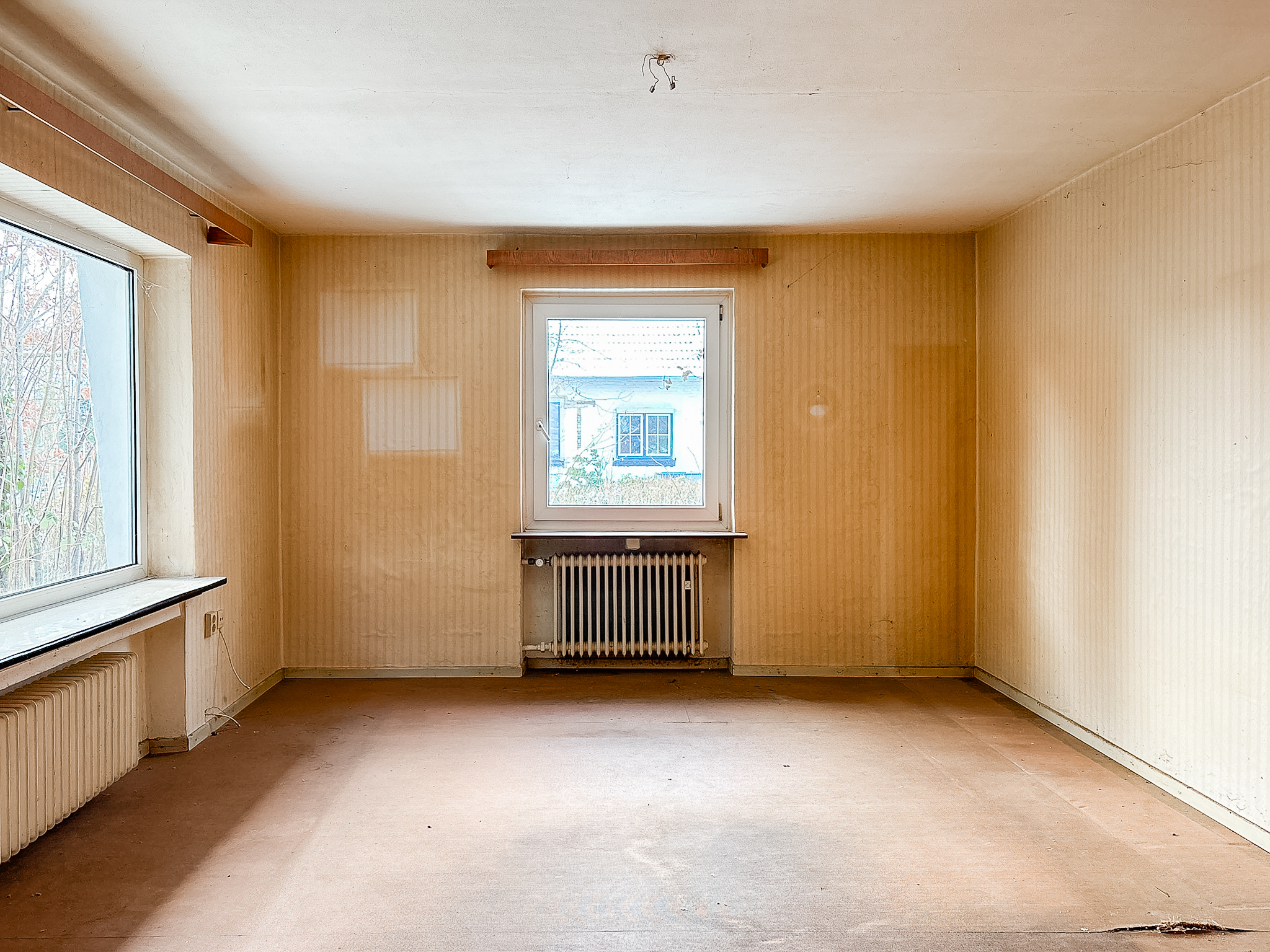 Charmantes Einfamilienhaus mit großem Grundstück und Sanierungspotenzial in Wedemark - Ansicht