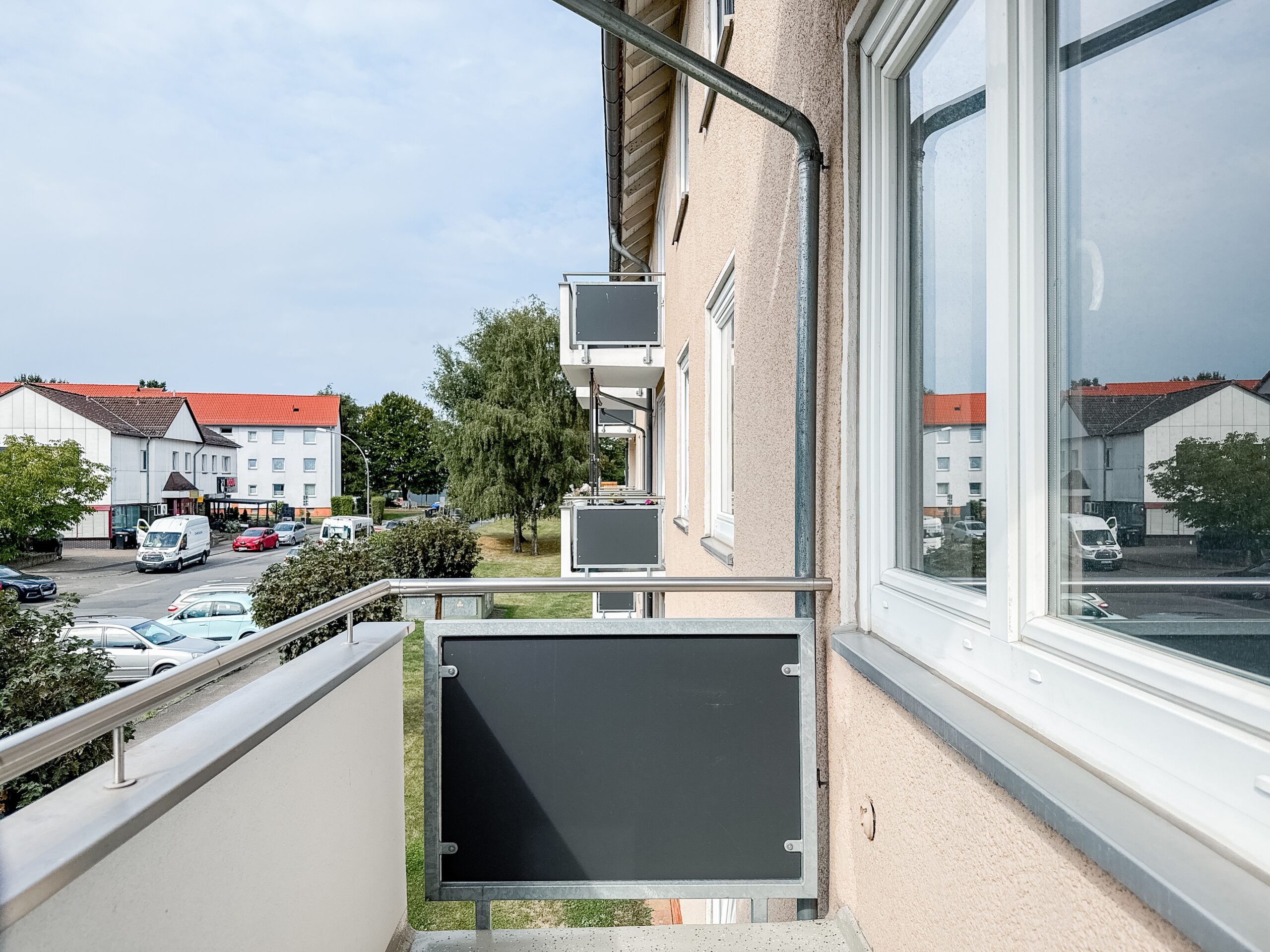 Sanierungsbedürftige 2-Zimmer-Wohnung mit Südbalkon auf Erbbaugrundstück - Ansicht